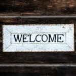 black and white wooden welcome signage